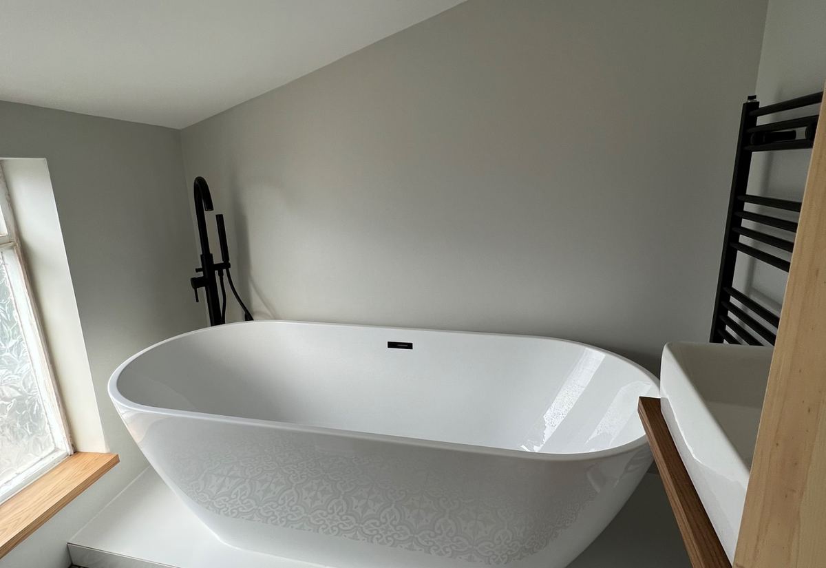 Freestanding bath fitted in a Norfolk cottage bathroom