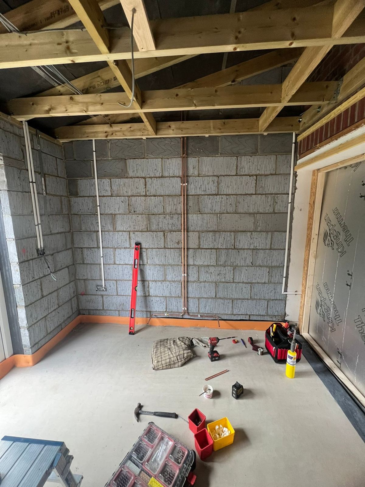 First fix copper and waste pipework on blockwork in a new extension