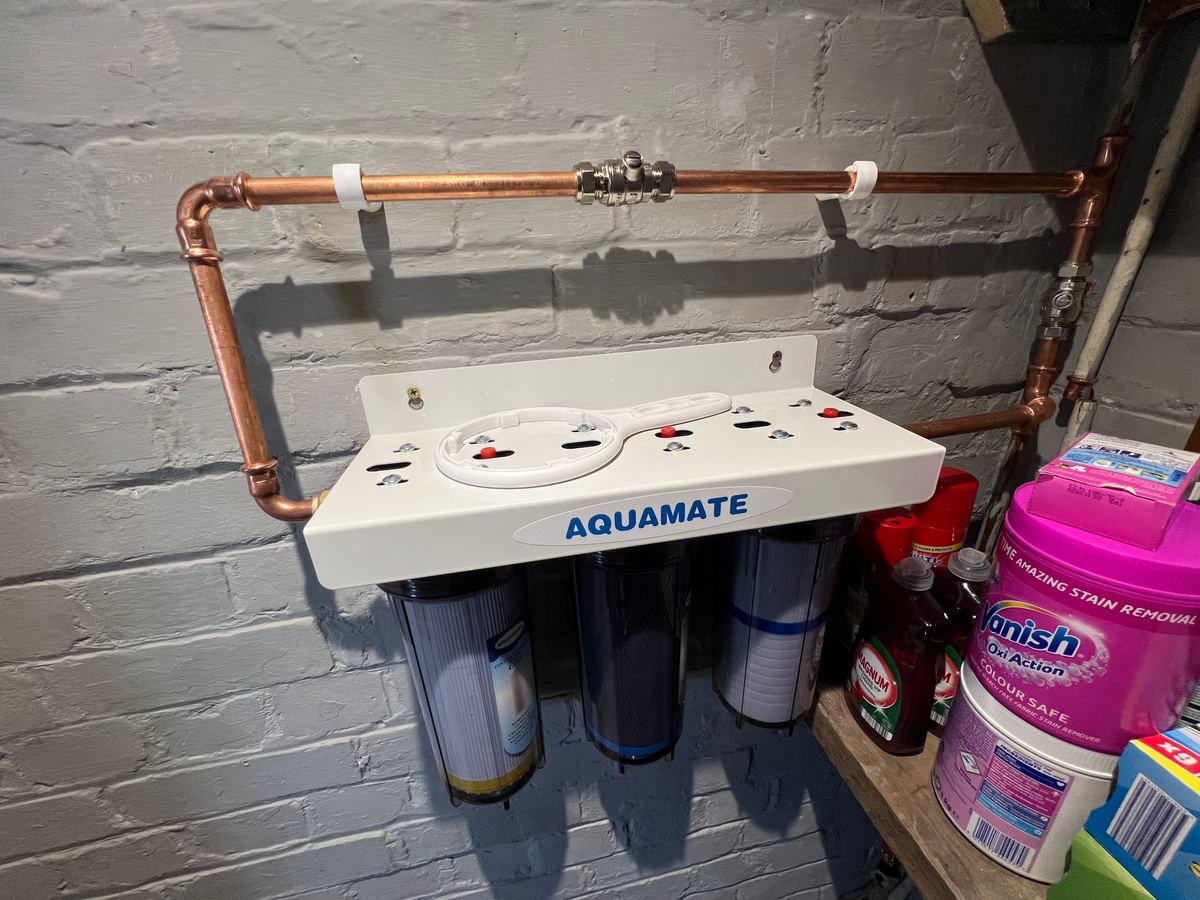 Three stage water filter on copper pipework